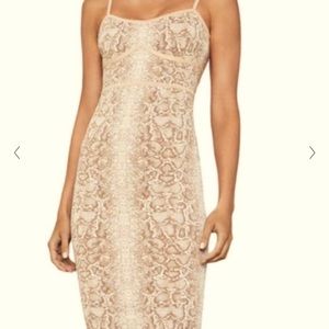 Very sexy never ever worn BCBG snake print dress!